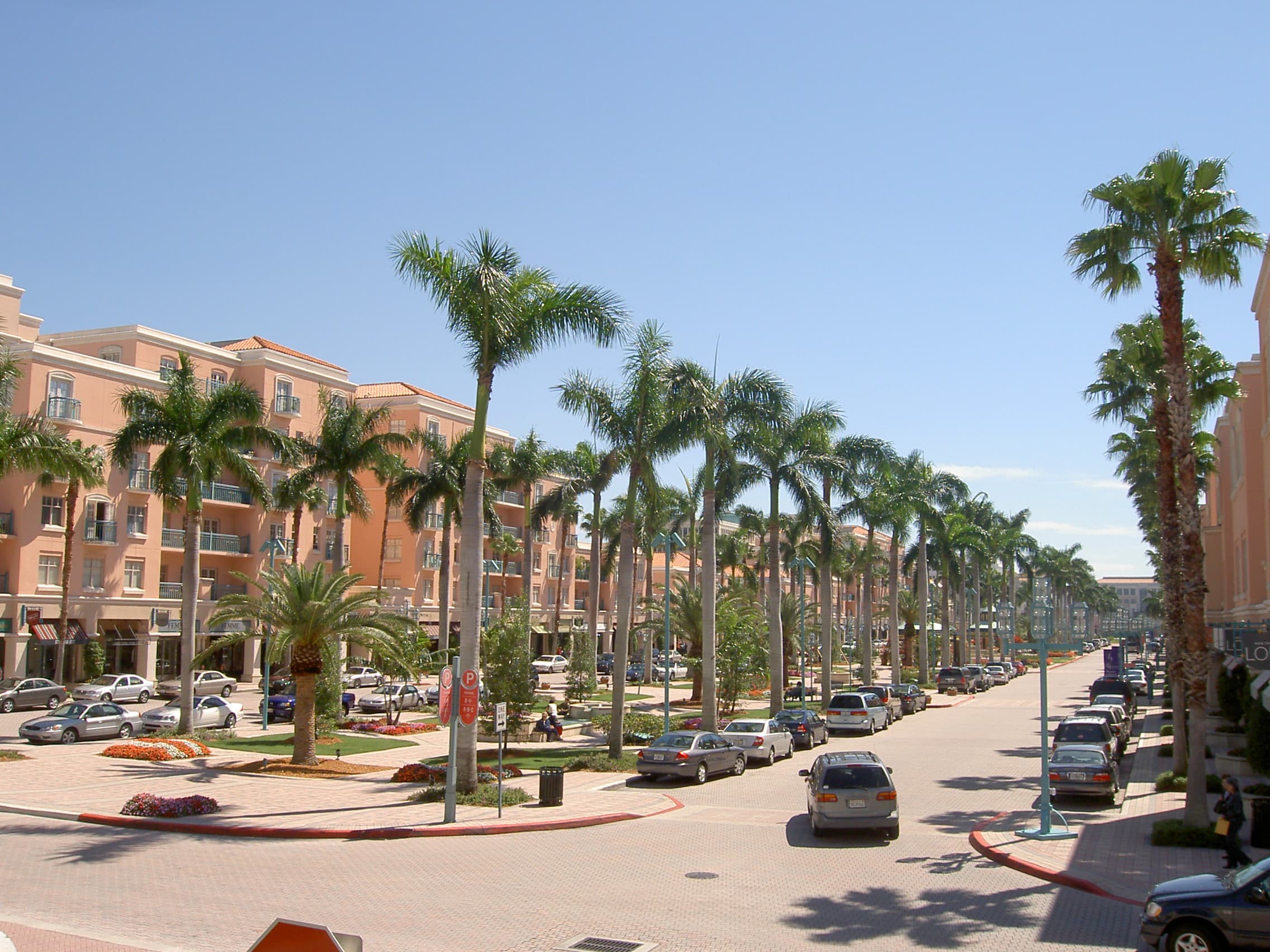 Mizner Park in Boca Raton, Florida, with palm-lined streets and Mediterranean-style buildings